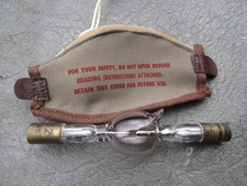 A UNUSED SHORT ARC ZENON BULB WITH BAG 250V TYPE XE/D   130mm