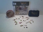Tackle Logic FINESSE Wrap with 18 lures free, plus black Pocket Magnom rod case and assorted fishing hooks.