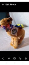 plush camel toy with a tag that says "Holy Land".