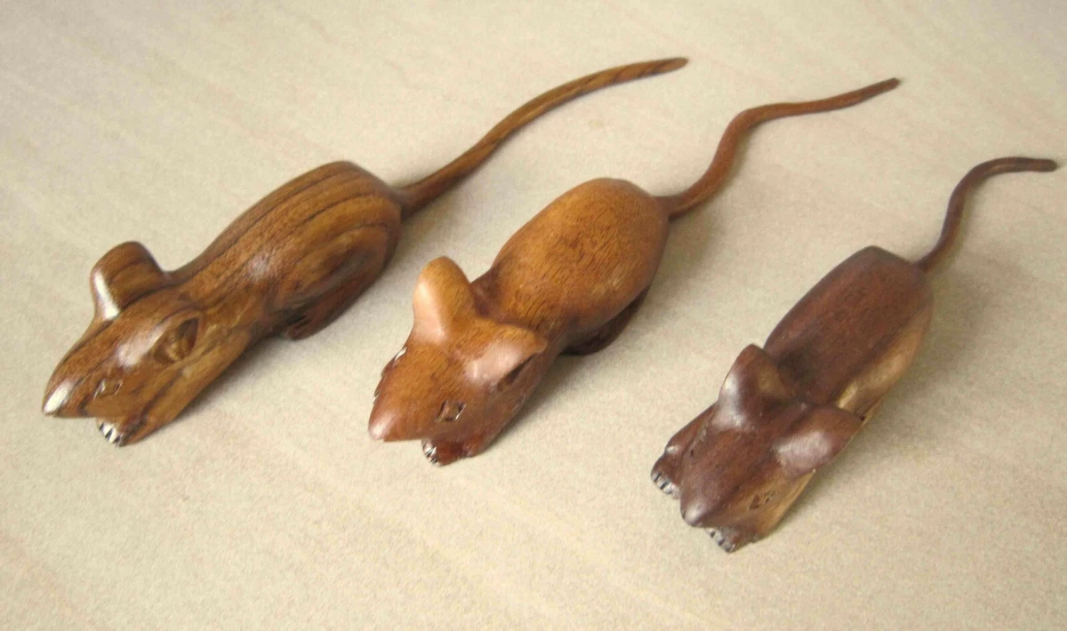 Small carved store wooden mouse