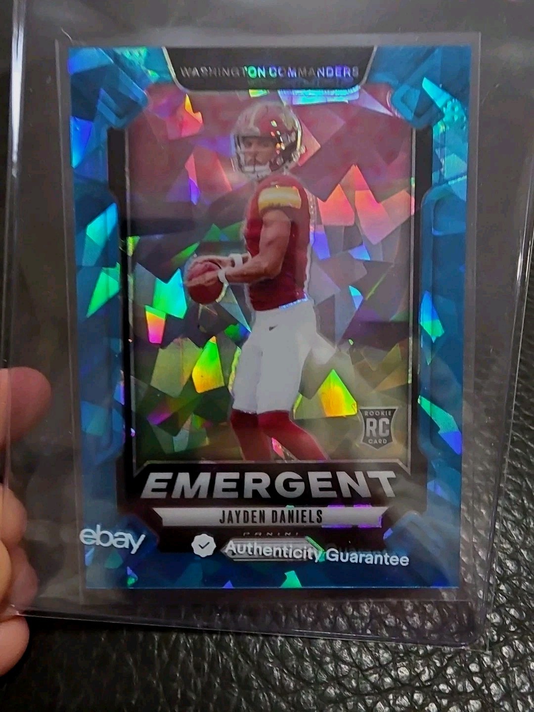 2024 Panini Prizm - Emergent Jayden Daniels #2 Blue Ice Prizm /99 (RC)