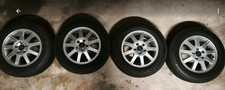 4x Original Ford Alufelgen 15 Zoll 5x108 ET 52.5 mit Winterreifen zu verkaufen
