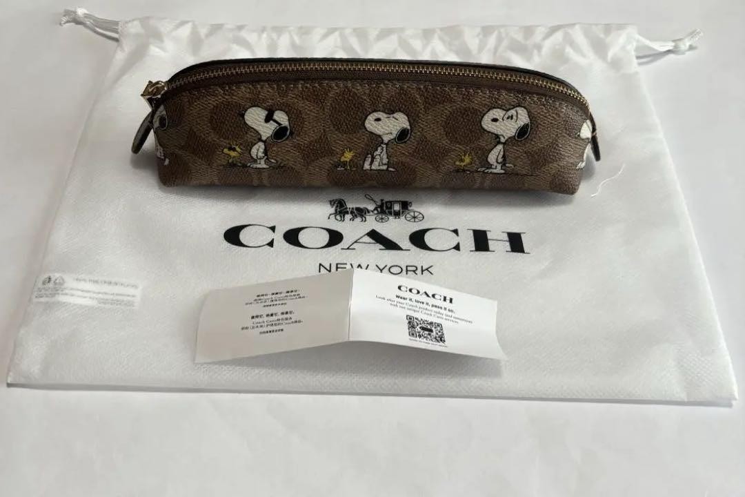 Estuche de lápices de lona COACH x Peanuts Snoopy Signature nuevo...