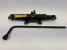 Ford Focus 2006-2011 Juego de herramientas de llave de tuerca de gato de neumático de repuesto trasero OEM 8S4A-17080-AA
