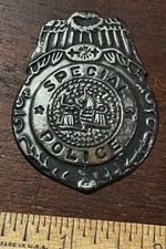 Child's Metal Special Police Badge, pressed metal, 1/5/8 x 2 1/8 in