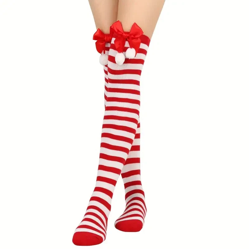 1 par de calcetines festivos navideños a rayas hasta la rodilla para mujeres niñas Foto 2 de 4