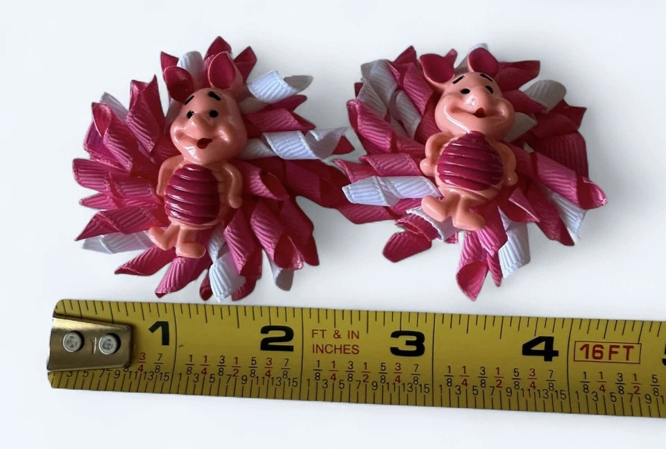 Lote de 2 pares de clips de cocodrilo con moño para niños pequeños de Winnie The Poo - Foto 4 de 4