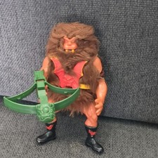 Mattel Masters of the Universe Grizzlor action figure with crossbow. 
