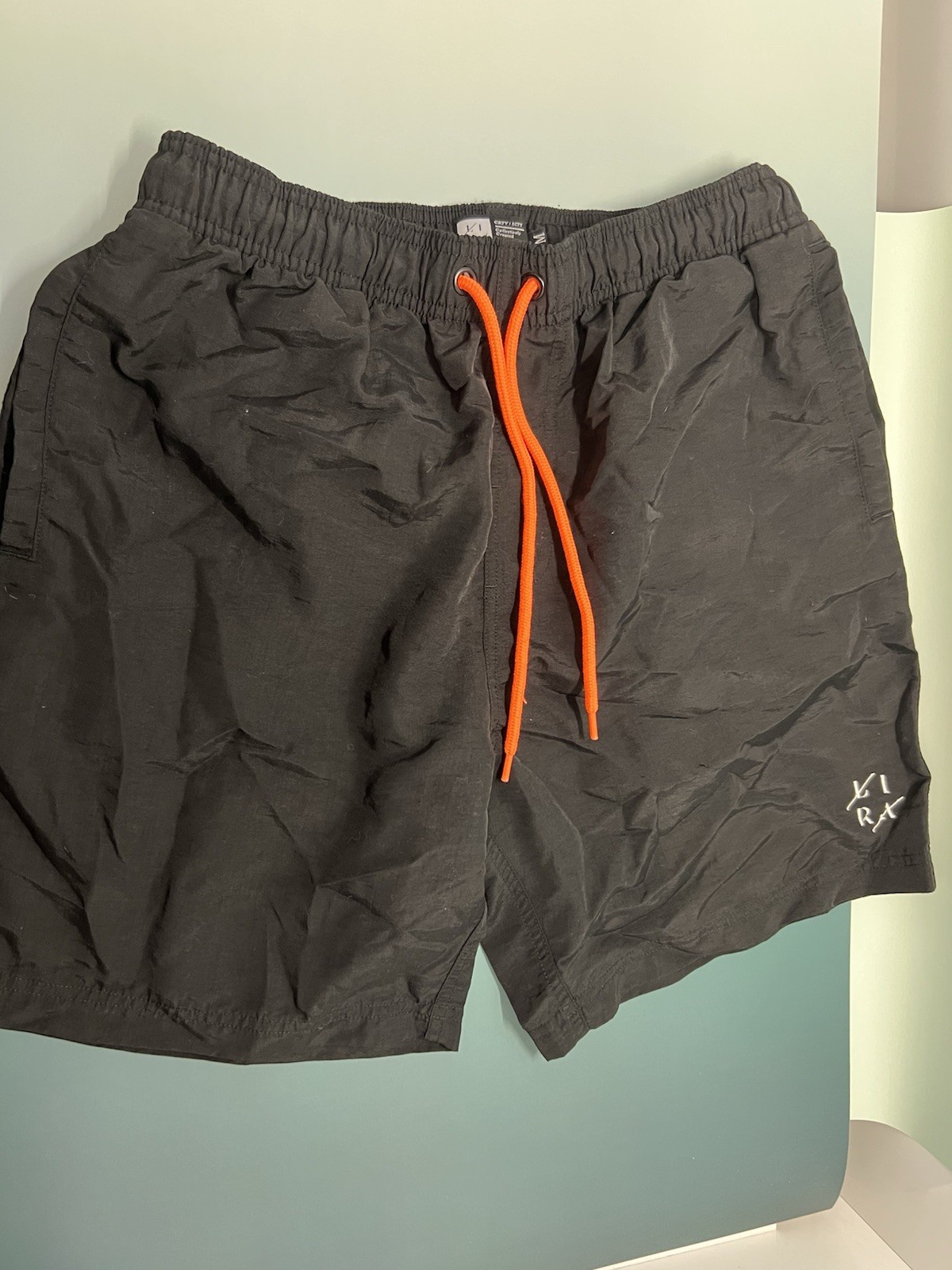 LIRA shorts Black With Orange Strings Size Medium New Without Tags