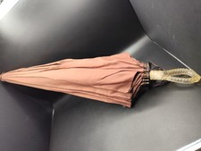Vintage Umbrella with Carved Lucite Handle in Good Working Condition Brown