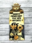 VINTAGE 9x3.5" SMOKEY THE BEAR FOREST FIRES CAMPING MOTOR OIL PORCELAIN GAS SIGN