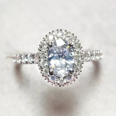 2.24Ctw Oval Moissanite Four Prong Halo Engagement Ring In 14K White Gold Plated