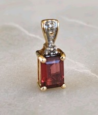 Garnet and diamond 9ct gold pendant