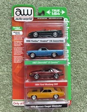 Auto World "Deluxe 4-Pack" featuring four 1:64 scale die-cast metal vehicles New