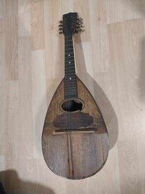 Mandoline. Gitarre. Antike Musikinstrumente. Laute. Banjo. Ukulele. Sammler.