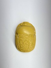 Figurine Egyptian scarab with drawings and hieroglyphs