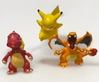 Tomy CGTSJ Nintendo Pokemon Figures Lot Of 3 Pikachu Charmeleon Charizard 2” Y2