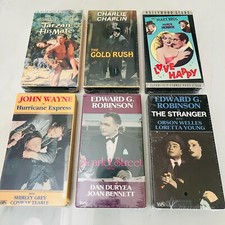 (6) Sealed VHS Classic Movies - Tarzan - Chaplin - Orson Welles - John Wayne