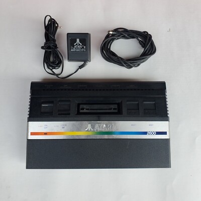 Atari  2600 Jr, 10 Games, 2 Joysticks, 4 Paddles, 1 Large Joystick. *Tested* 