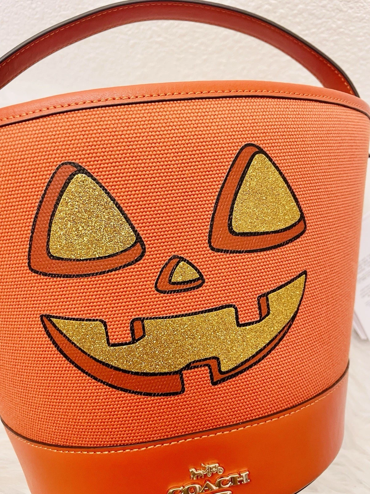 Secchiello Coach dolcetto o scherzetto con zucca di Halloween nuovo con etichetta CW533 arancione scuro