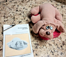 Vintage Electonic Pound Puppies Radio 1986 w/ working AM radio user's mnl