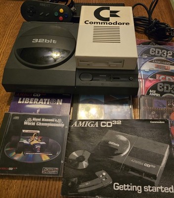 Commodore Amiga CD32 With 3.5 Floppy Add-On And Games