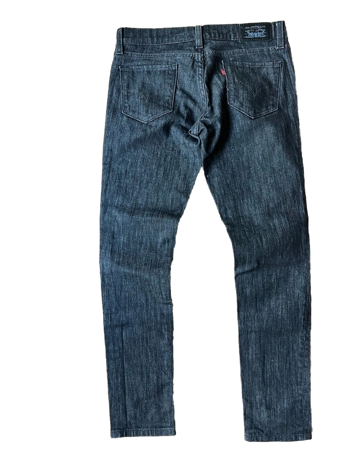 Pantalones de mezclilla ajustados de tiro ultra bajo Levi's 521 para mujer talla 2/26 negros 5 bolsillos Foto 2 de 4