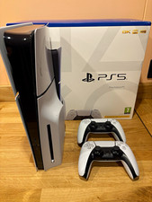 Sony PlayStation PS5 1TB Disc Edition 8K HDR + 2 DualShock controllers.