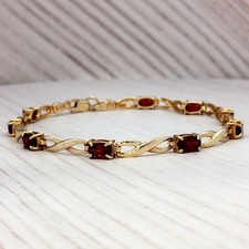 Granat Gliederarmband in 10k Gelbgold.