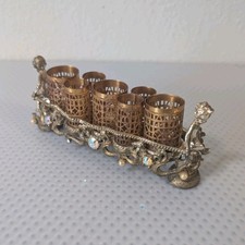 Bandeja porta lápiz labial tocador de metal dorado ornamentado, 7 ranuras, estrás