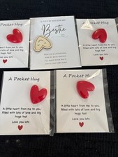 NEW SET OF 5 POCKET TAG HUGS.