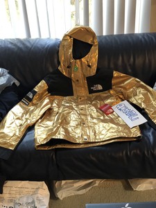 supreme x tnf gold