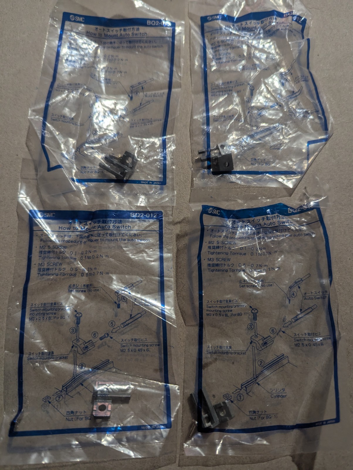 NEW LOT OF 4 GENUINE SMC BQ2-012 MOUNTING BRACKETS