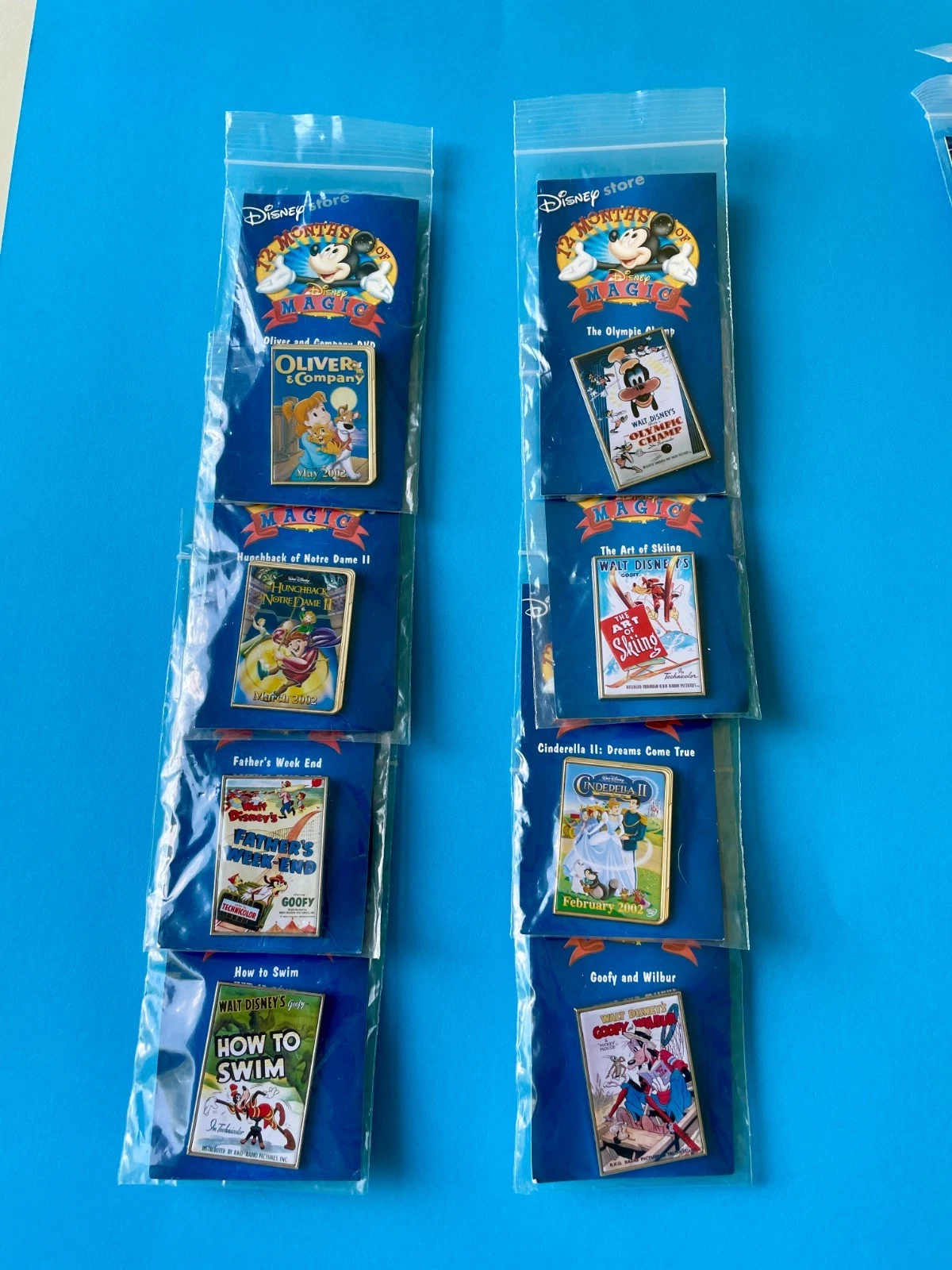 New ListingSet of 8 Vintage Disney Store "12 Months of Magic" movie poster pins from 2002