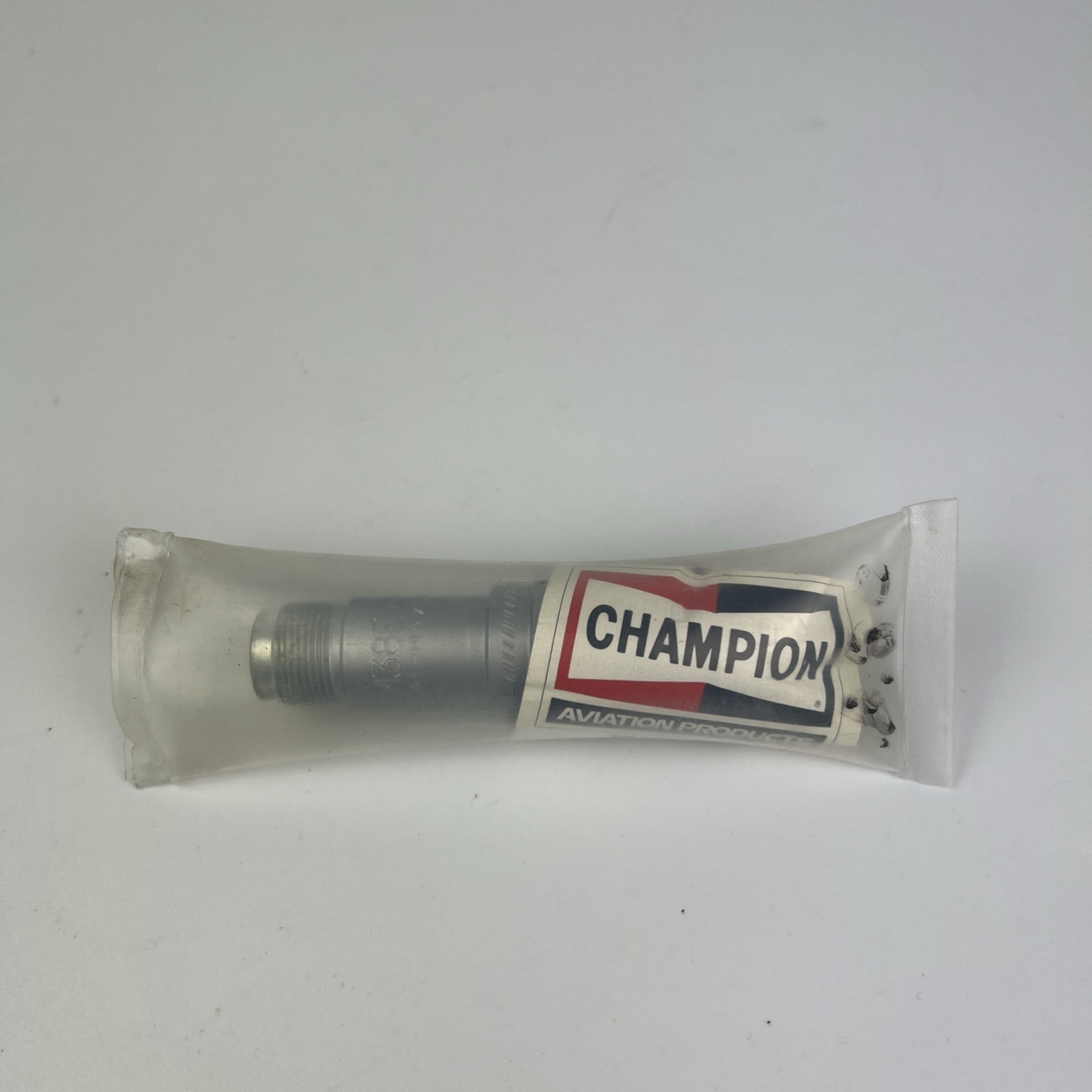 NEW Champion REM38E, Aviation Spark Plugo Cover Cut  READ Description