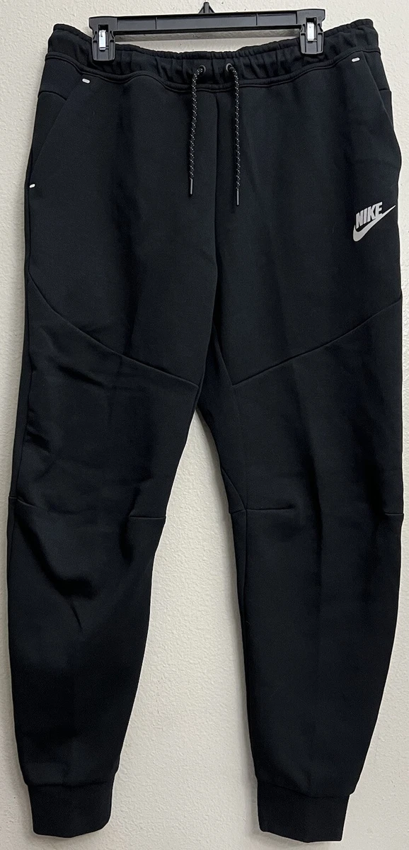 Nike tech hotsell pants reflective