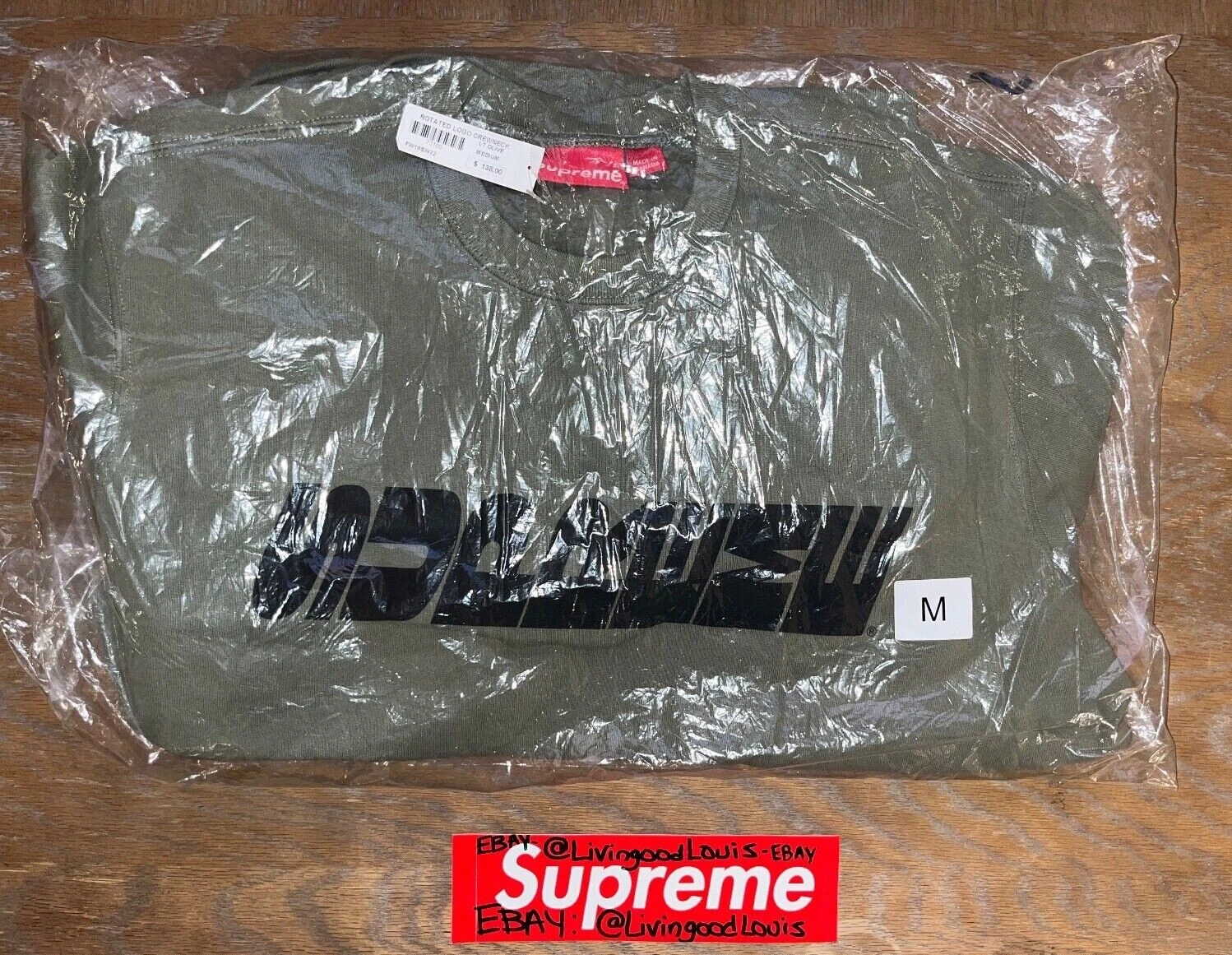 NEUF Supreme FW19 Logo rotatif Sweat shirt à col crevette taille moyenne couleur olive