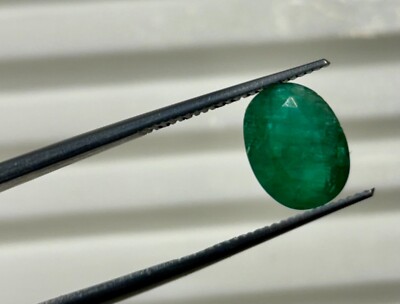 natural gemstone emerald zambia green color oval shape opaque