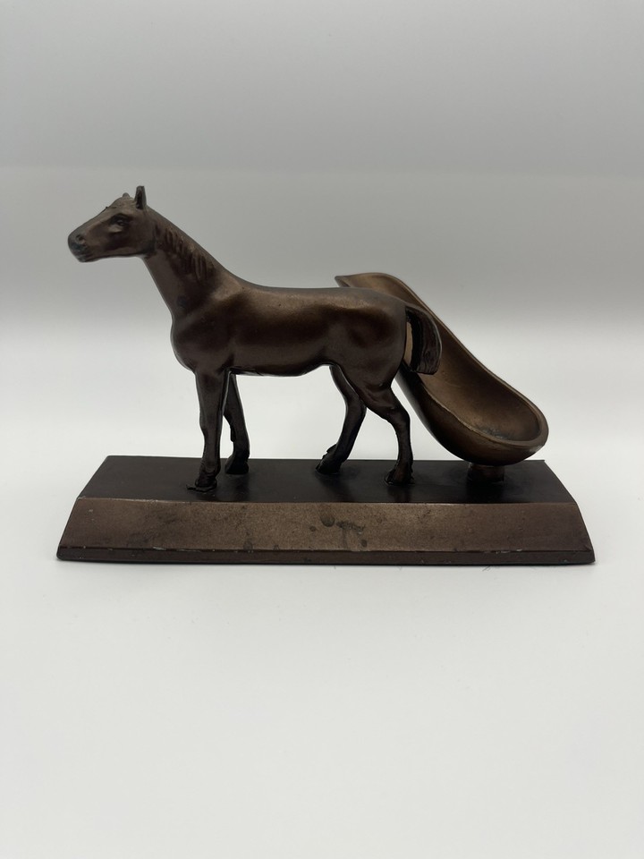 A bronze horse doubling as a pipe holder, pen rest, AND trinket dish — the kind of multi-tasking sculptural desk piece that sparks instant conversation.