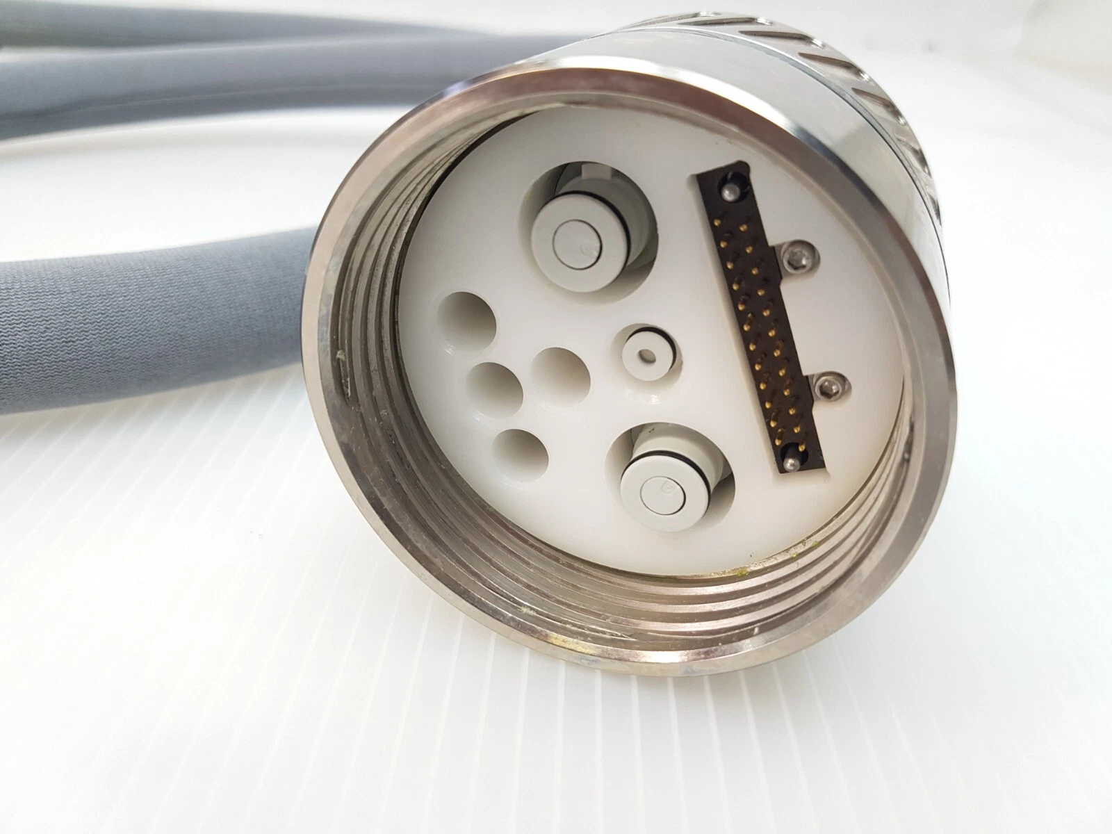 Connector face of the LightSheer handpiece cable with multi-pin connector