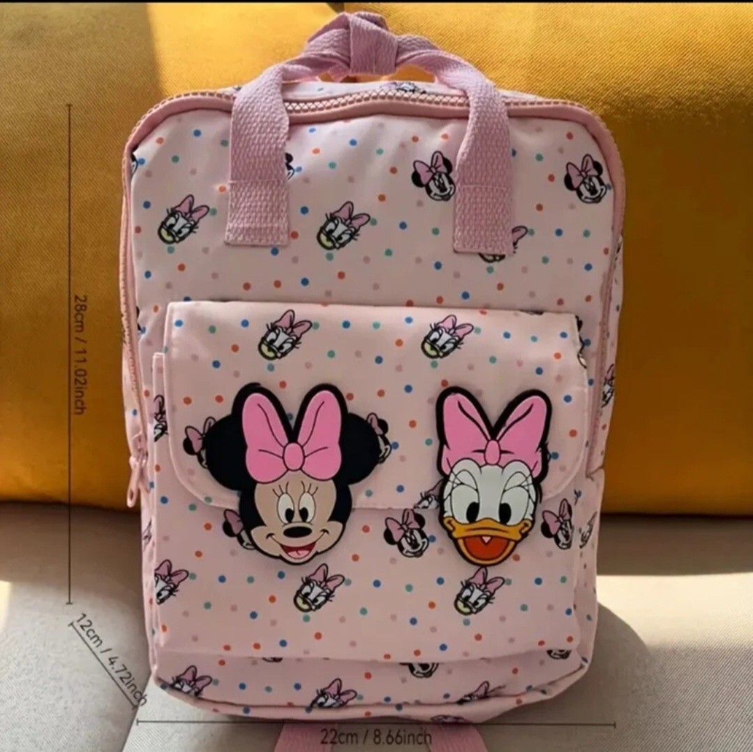 Mochila minnie disney de color rosa.Medidas en una de las fotos.
