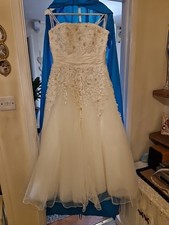 Justin Alexander Three Quarter Length Wedding Dress.