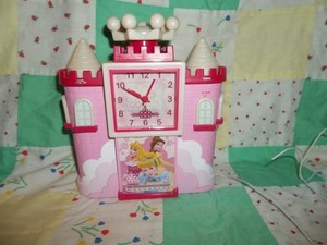 Disney Princess Castle clock radio--works, alarm, snooze crown on top, batteries