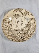 This is a Gildea & Walker "Melbourne" pattern brown transferware soup plate.
