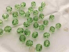  12 Swarovski  Crystals - 6mm Peridot