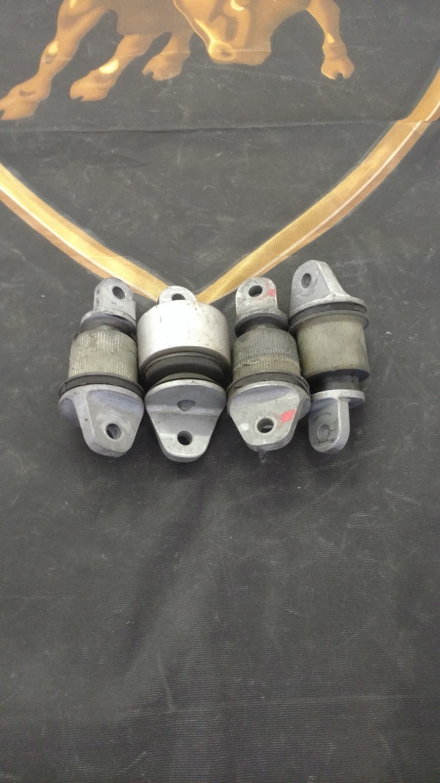 MCLAREN MP4-12C SUSPENSION ARM BUSHING OEM 