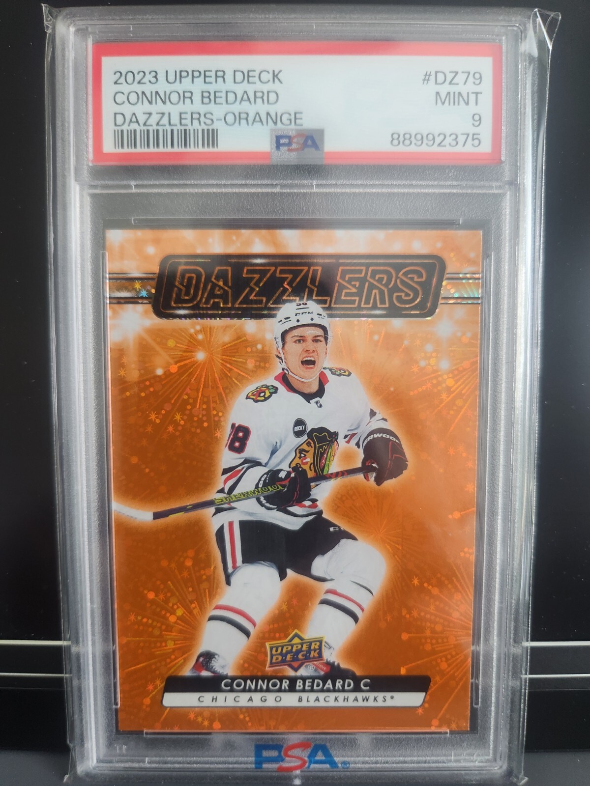 2023 UPPER DECK CONNOR BEDARD ROOKIE DAZZLERS ORANGE #DZ79 PSA 9 Blackhawks