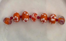 Floral Orange Lampwork Glass Beads 7 Pc. D1 