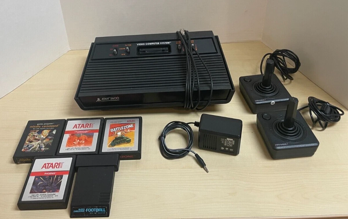 Atari 2600 4 Switch Vader Console with 2 joysticks and 5 games