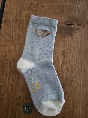 Steiff Socken / Strümpfe mit Teddykopf grau Größe 27-30